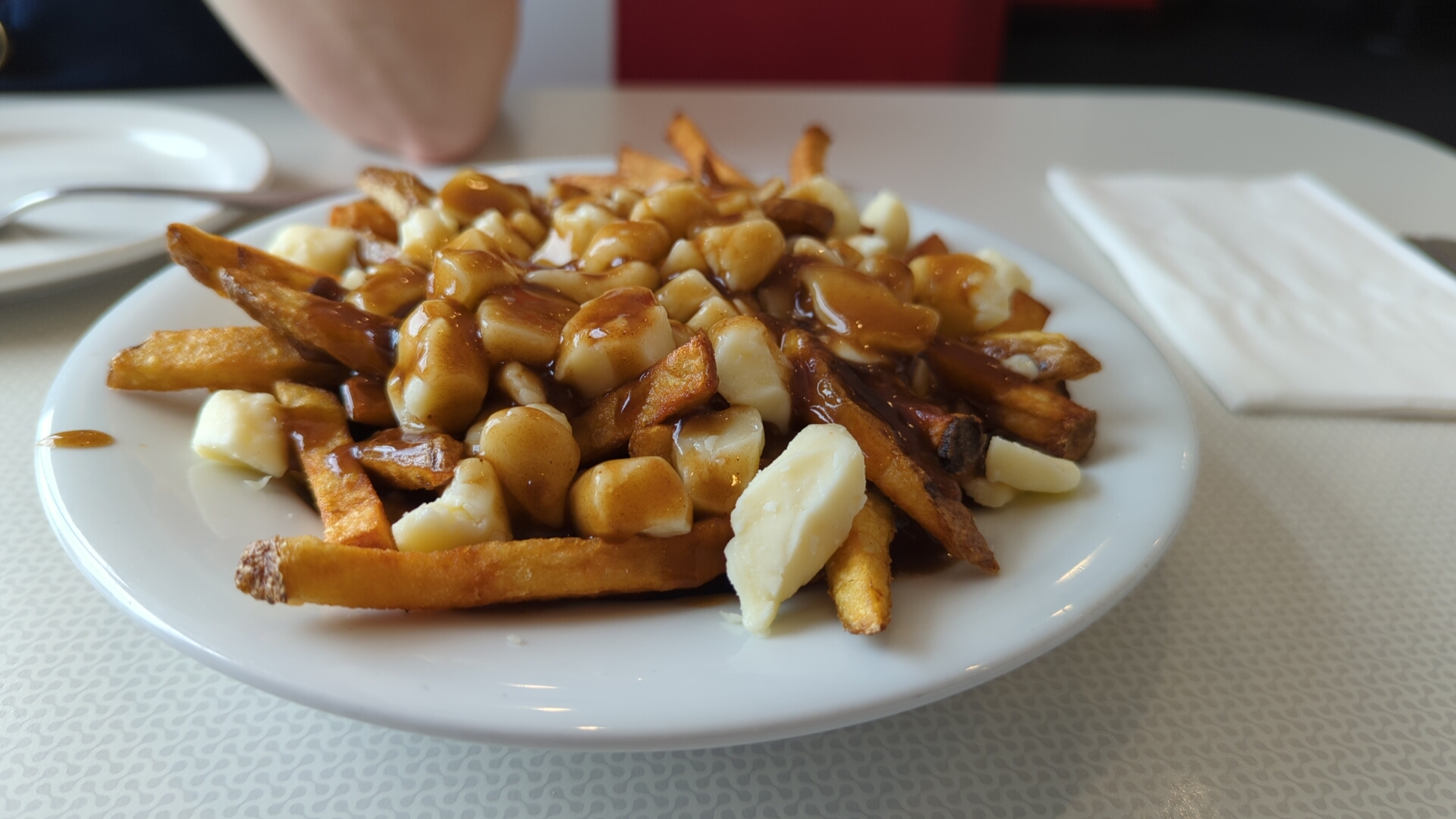 A classic poutine with fries, cheese curds and gravy, the dish behind the hunt for the best poutine in Montreal