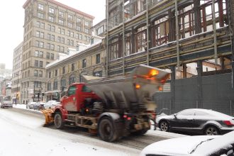 Snow clearing on Notre-Dame Street in Montreal